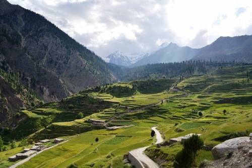 What is in the picture? lake steppe coast valley