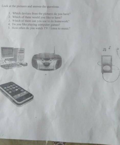 Writing Look the pictures and wwer the questions1. Which devices from the pictures do you have2. Whi