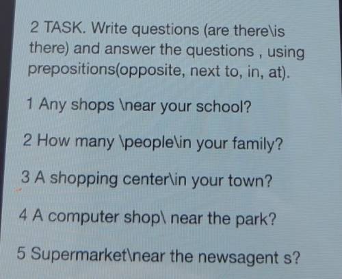 2 TASK. Write questions (are there is there) and answer the questions, usingprepositions(opposite, n