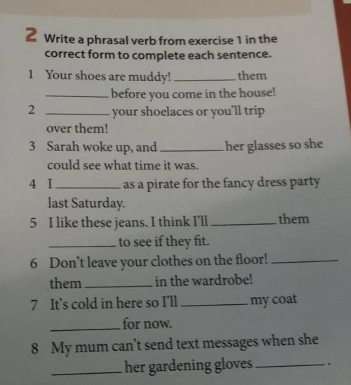 2 Write a phrasal verb from exercise 1 in the correct form to complete each sentence.1 Your shoes ar