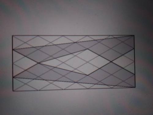 Из бумаги вырезали прямоугольник 5×4 см, после этого его расчертили линиями под 45° и закрасили обла